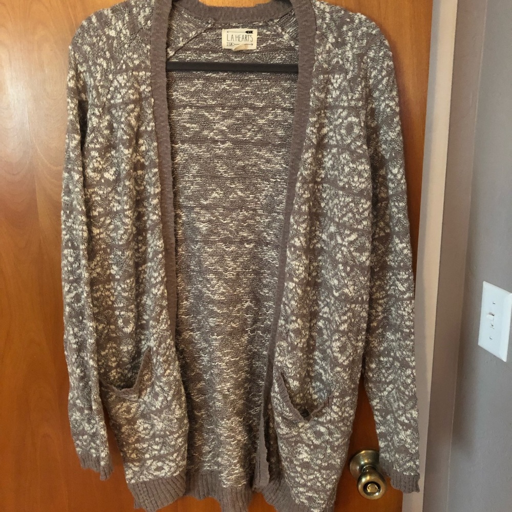 A grey and white cardigan!